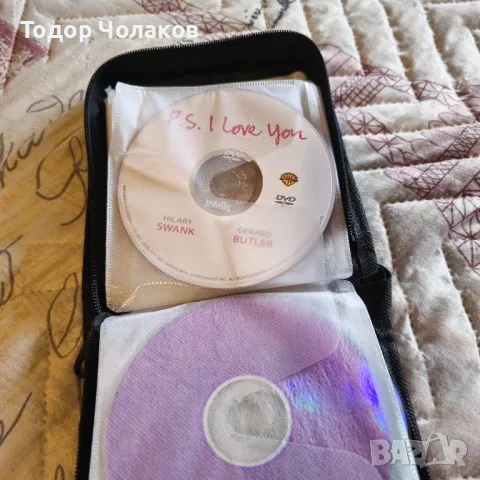 Албум от 31 двд филма.

, снимка 9 - DVD филми - 47841257