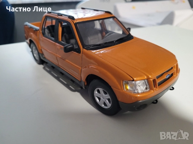 Модел Ford Explorer Sport Trac Orange Maisto 1/18 , снимка 13 - Коли, камиони, мотори, писти - 52344129