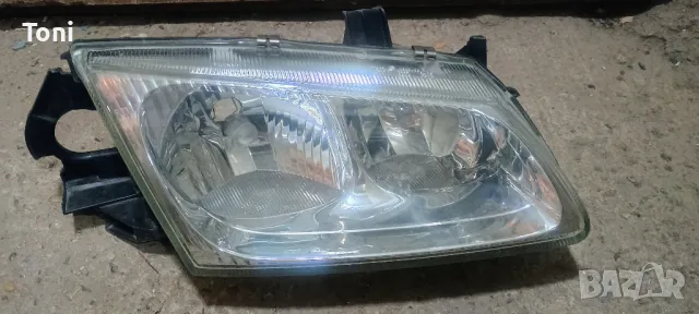 фар за нисан алмера 2000-2002г.