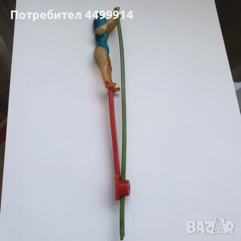 Механична пластмасова играчка от 80-те, Акробатска пръчка