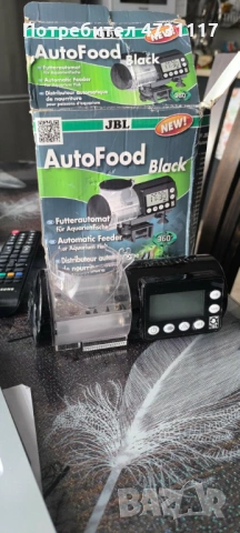  Автоматична хранилка за риби- черна. JBL AutoFood BLACK  Автоматична хранилка за риби- черна. JBL A, снимка 5 - Оборудване за аквариуми - 53961807
