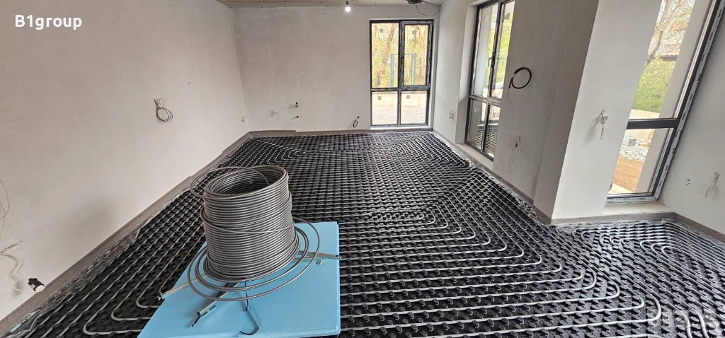 B1group – Професионално изграждане на отоплителни системи с подово отопление VIESSMANN, снимка 1