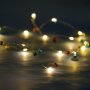 Коледни лампички с цветни камбанки, 20 LED, 2.2м, Топло бяло, снимка 1 - Лед осветление - 42744132