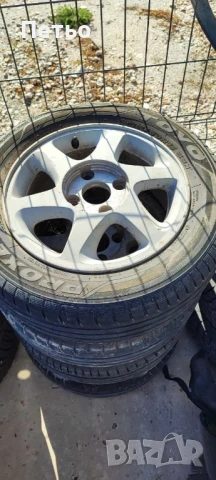 Гуми с джанти за Нисан Примера GT 1998