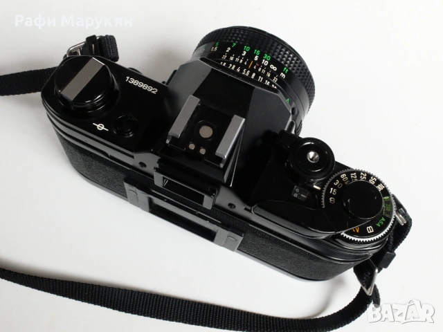 Легендата SLR филмов "CANON AE-1"-черен, като нов, снимка 3 - Фотоапарати - 54081236