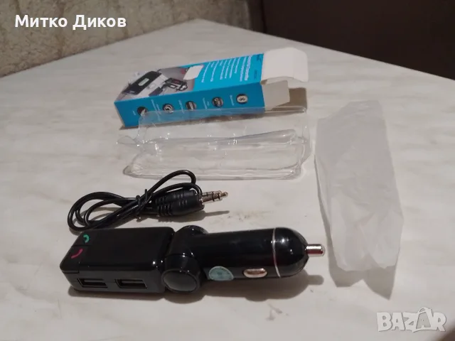 безжичен Bluetooth FM трансмитер за кола (модел BC06), предназначен за възпроизвеждане на музика и п