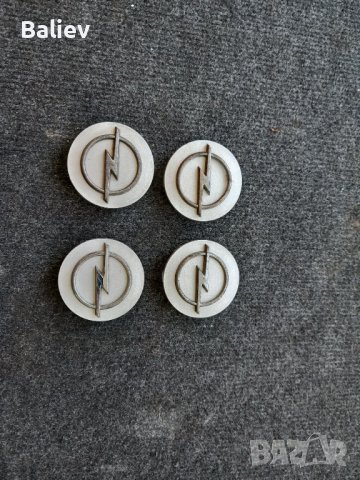 Капачки за джанти Opel 60/57мм, снимка 9 - Аксесоари и консумативи - 44443419