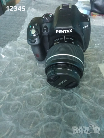 Продавам професионален фотоапарат PENTAX K50 + подарък стойка, снимка 8 - Фотоапарати - 54333474