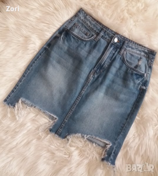 СТРАХОТНА дънкова пола в светъл деним с накъсан/разръфан ефект в долния край, снимка 1