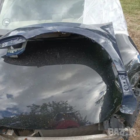 Преден ляв калник за Дачия Дъстър , снимка 1