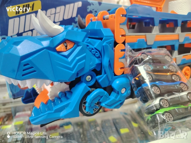 Комплект динозавър камион с колички – паркинг и катапулт 2 в 1 , снимка 6 - Коли, камиони, мотори, писти - 52719621