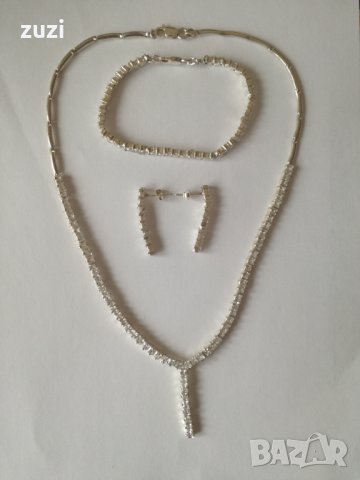 Комплект с бели циркони, колие, гривна и обеци. Сребро проба 925. 