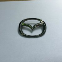 емблема мазда dc0151730 MAZDA 323 , снимка 2 - Части - 37505593