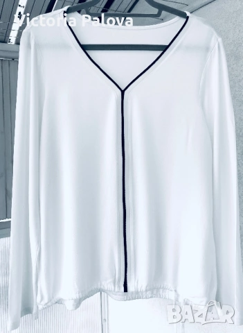 Елегантна блуза с ефектен силует и спортен шик