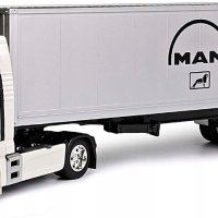 MAN TGX камион с ремарке - мащаб 1:32 на Welly моделът е нов в кутия, снимка 1 - Колекции - 44291494
