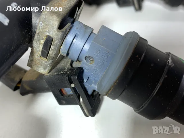 Горивна рейка с дюзи за LendRover Freelander 0280150703, снимка 2 - Части - 49238533