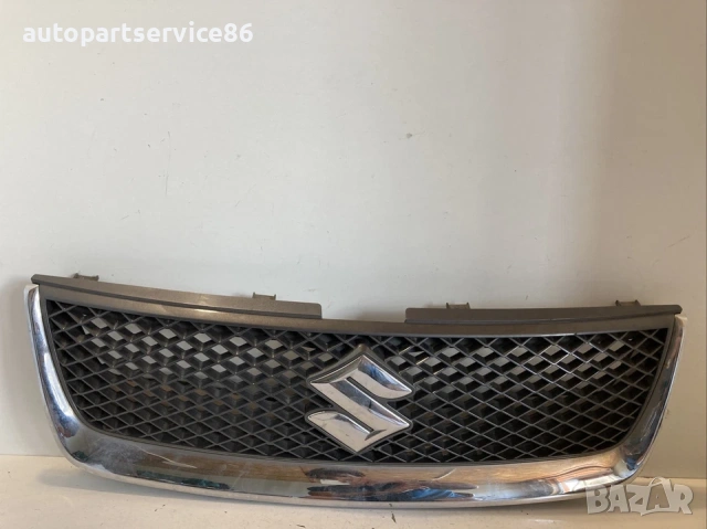 Лого емблема решетка хром за Suzuki Grand Vitara 1.9 Ddis (2008) 71743-65J0