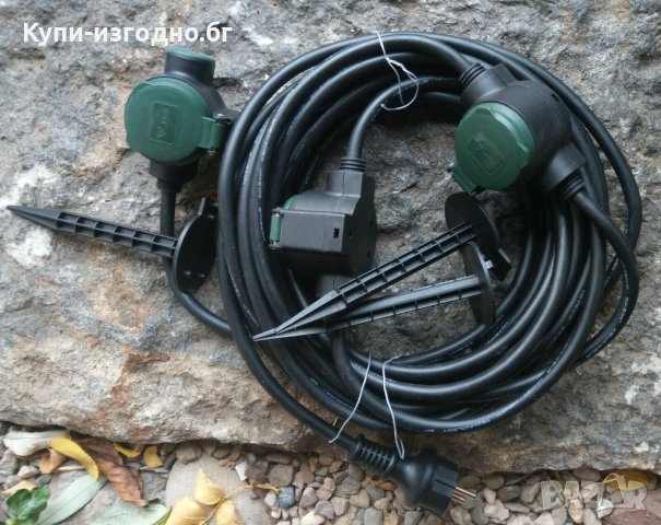 Rev Германия , Удължител с гумен захранващ кабел, 3-посочен , 10 м, ултра гъвкав , черен с зелено IP, снимка 1 - Други - 31145907