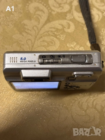 KONICA MINOLTA DIMAGE X50, снимка 7 - Фотоапарати - 52466694