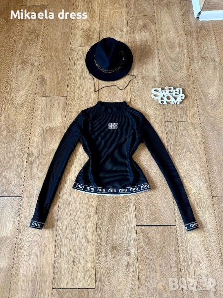 Елегантна и удобна блуза Miu Miu от рипс, в черен цвят. Подходяща за различни поводи и лесно комбини, снимка 1