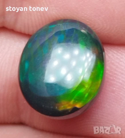 Голям черен опал с изумяваща игра на цветове тип дъга 6.59кт! Нов!, снимка 2 - Други - 50923569