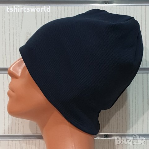 Нова зимна шапка в тъмносин цвят с индиго оттенък, снимка 1 - Шапки - 32047400