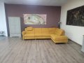 Ъглов диван от плат цвят канела DAKAR с електрически релакс механизъм, снимка 1 - Дивани и мека мебел - 44216262