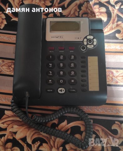 Телефон ALKATEL