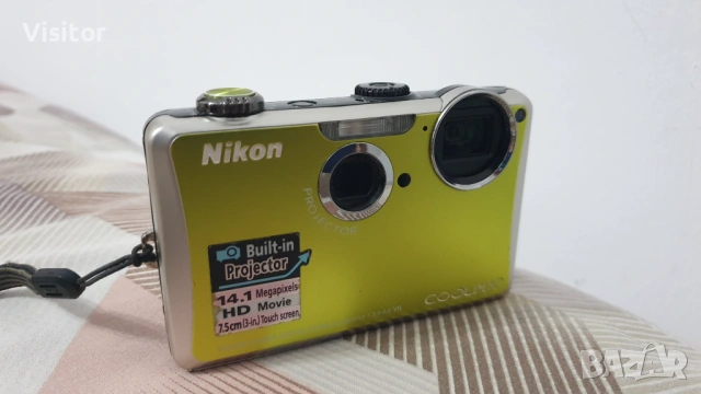 Nikon Coolpix S1100pj   14.1 mPx, снимка 5 - Фотоапарати - 54349656