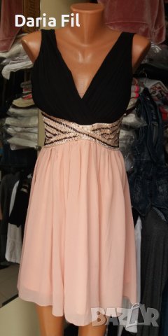 ИЗКЛЮЧИТЕЛНО КРАСИВА рокля с остро деколте и пайети около талията