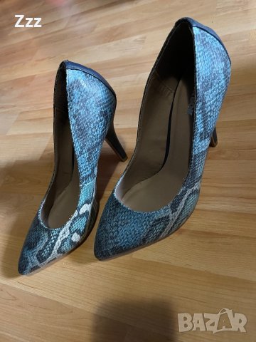 Змийски обувки на ток