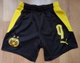 BVB / PUMA / Borussia Dortmund - детски футболни шорти на  Борусия Дортмунд, снимка 1 - Детски къси панталони - 42576571