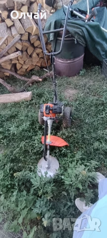 Тример с колела и дръжки