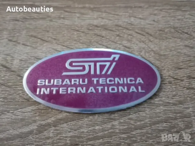 Subaru STI розова емблема