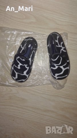 Детски обувки в бяло и черно