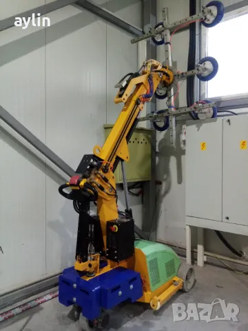 Робот за вакумно повдигане на стъкло