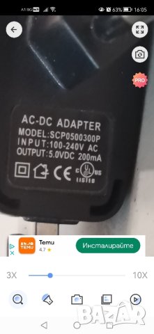 AC-DC адаптер input 100-240V output 5v model:scp0500300p, снимка 2 - Кабели и адаптери - 44242354