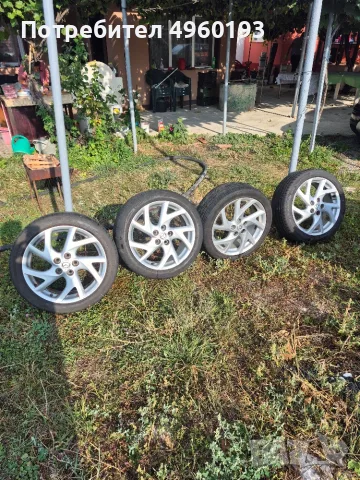Джанти 5x114.3 с гуми 18 цола оригинални за мазда 