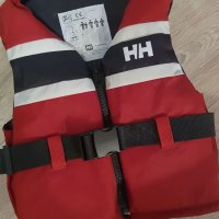 Спасителна жилетка Helly Hansen 50-60кг, снимка 1 - Водни спортове - 36833635