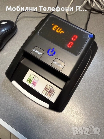 Машинка за разпознаване на фалшиви евро и долари банкноти