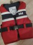 Спасителна жилетка Helly Hansen 50-60кг, снимка 1 - Водни спортове - 36833635