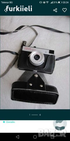 стар руски фотоапарат Смена 8 с кожен калъф.