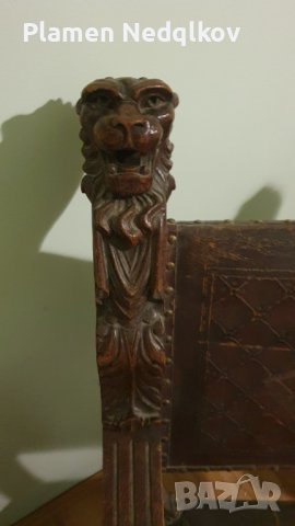 Масивен стар стол със орнаменти,глава и крака на лъв