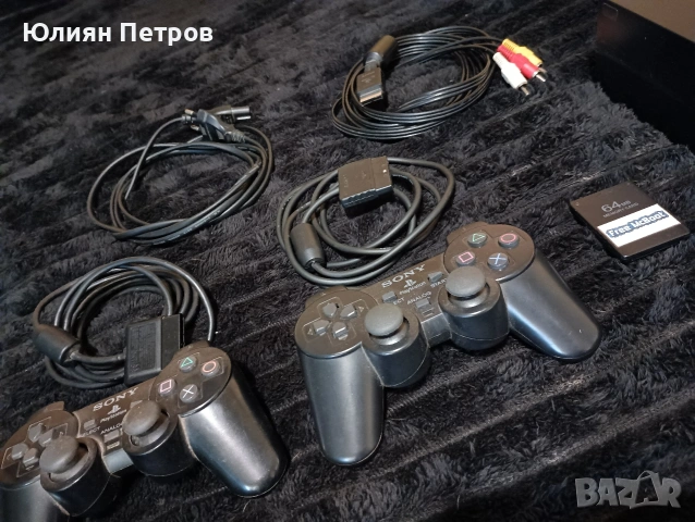 Продавам Пс2 хакната с оригиналните и кабели 2бр джойстици мемори карта и 11бр игри, снимка 2 - PlayStation конзоли - 54308242