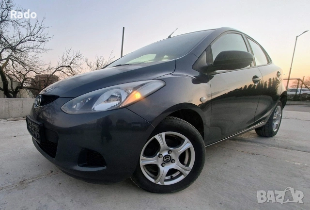 Мазда 2 2011г 1.3i