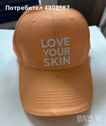 Оранжева шапка с козирка ISDIN