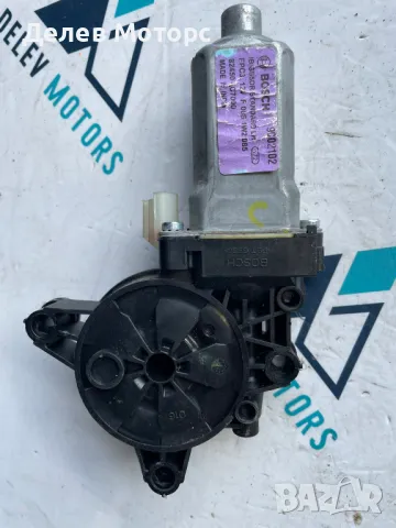 82450-C7000 моторче за стъклоповдигач предно ляво от Hyundai I20 1. 2I, 84ph, 5 speed, engine G4LA, снимка 2 - Части - 50324407