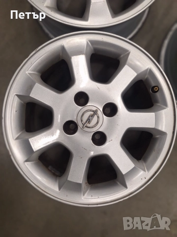 ОРИГИНАЛНИ ЖЕЛЯЗНИ ДЖАНТИ-ОПЕЛ -4Х100Х56.6-15 ЦОЛА, снимка 5 - Гуми и джанти - 52839523