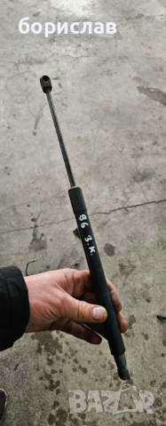 Амортисьор заден капак за пасат б6 