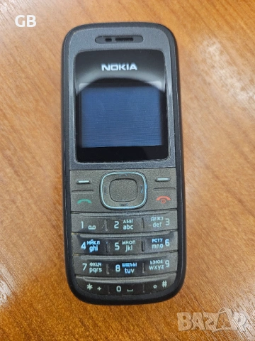 Nokia 1208 с оригинално зарядно + кожено калъфче, снимка 10 - Nokia - 50212205